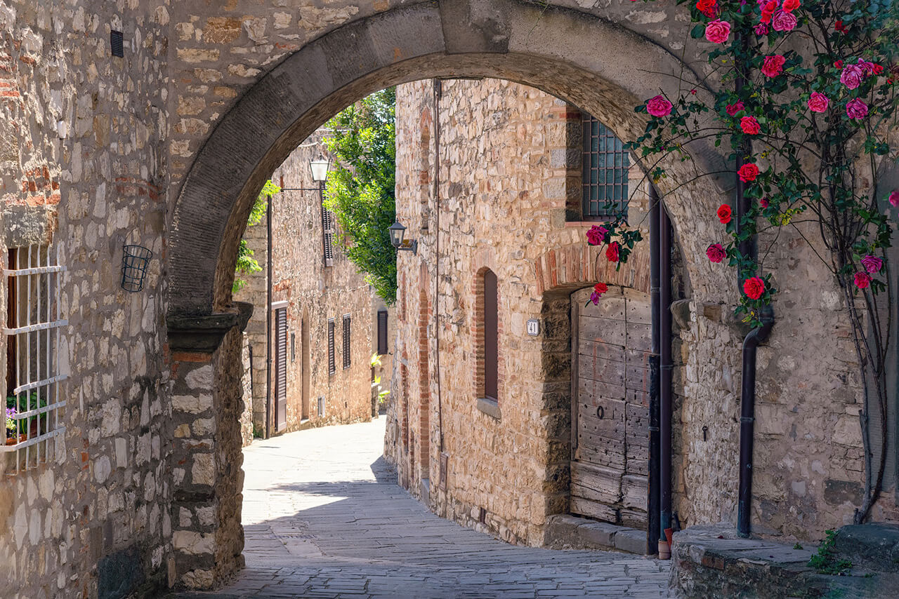 Walk through the clean old streets of Gaiole in Chianti.
