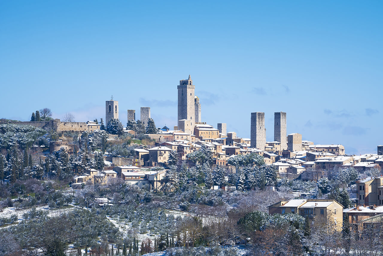 San Gimignano in winter with snow, near Florence.
