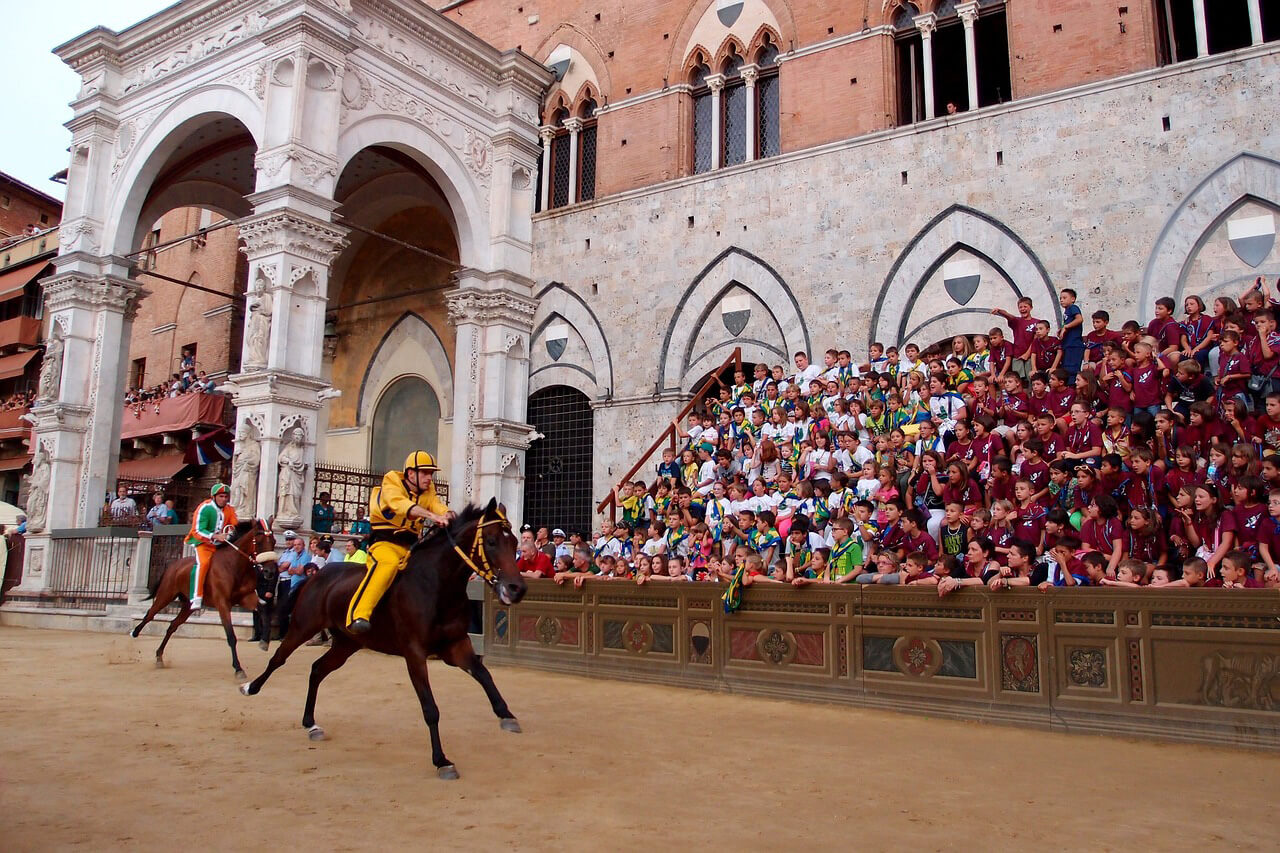 The public attends a very important event in the Tuscan region: the Palio di Siena