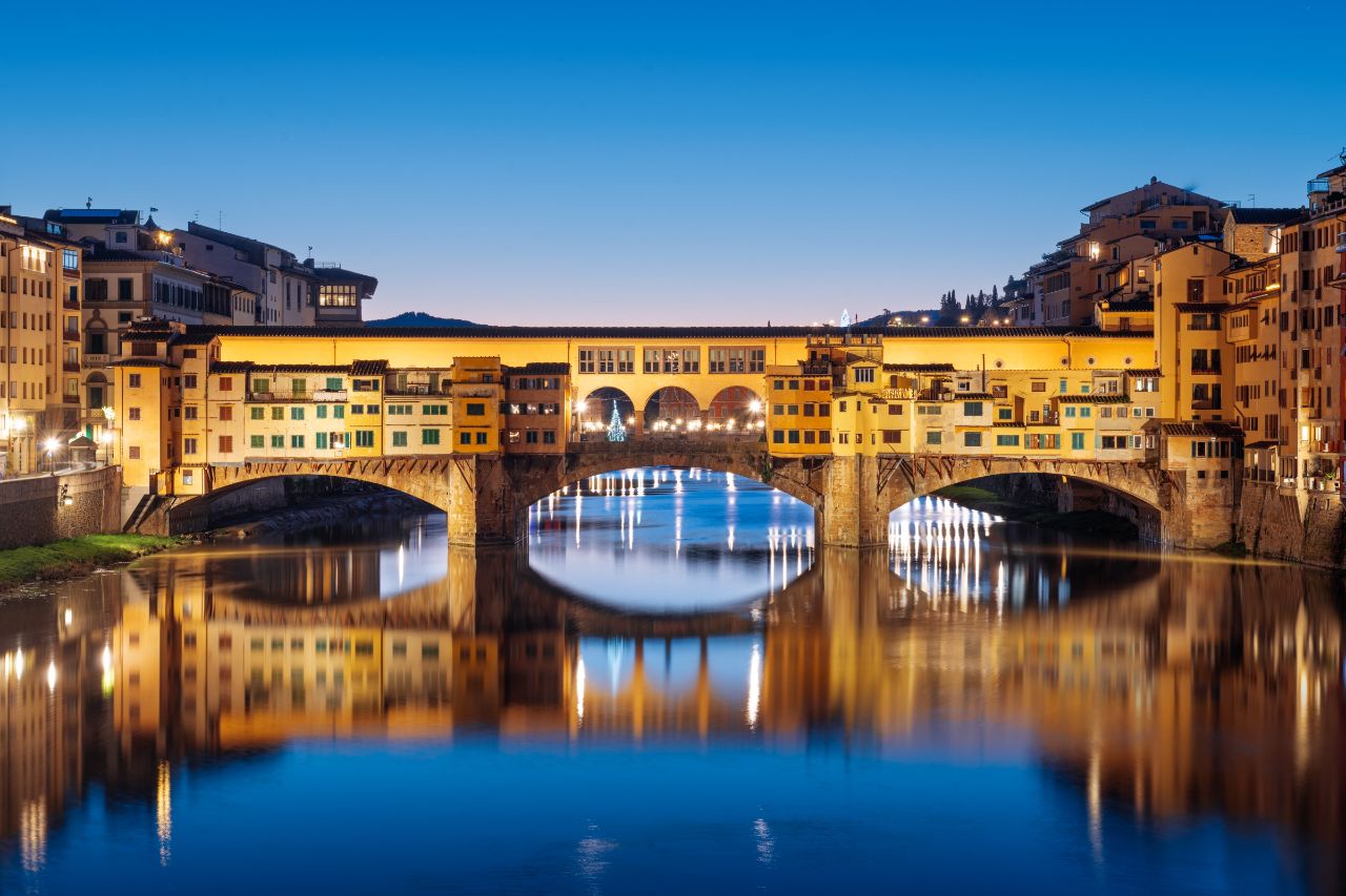 The view of historic bridge with jewelry shops of Ponte Vecchio in Florence, Italy