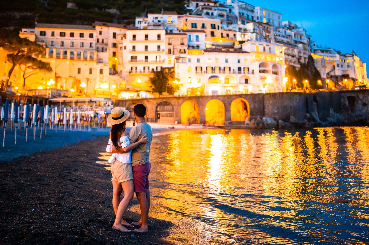 An engaged couple has just reached a new destination on the Amalfi coast using public transportation