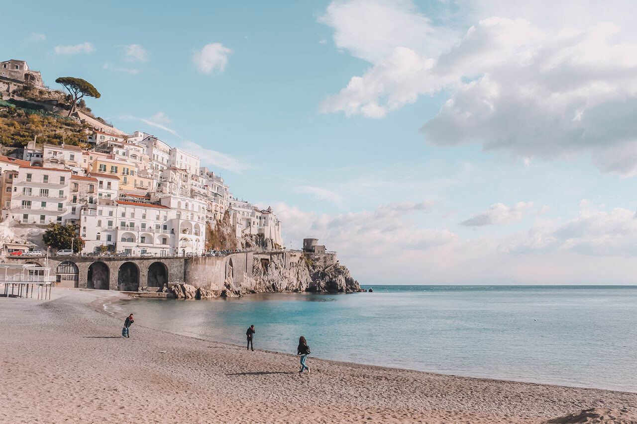 Tourists Walking on the beach of Positano, near Naples