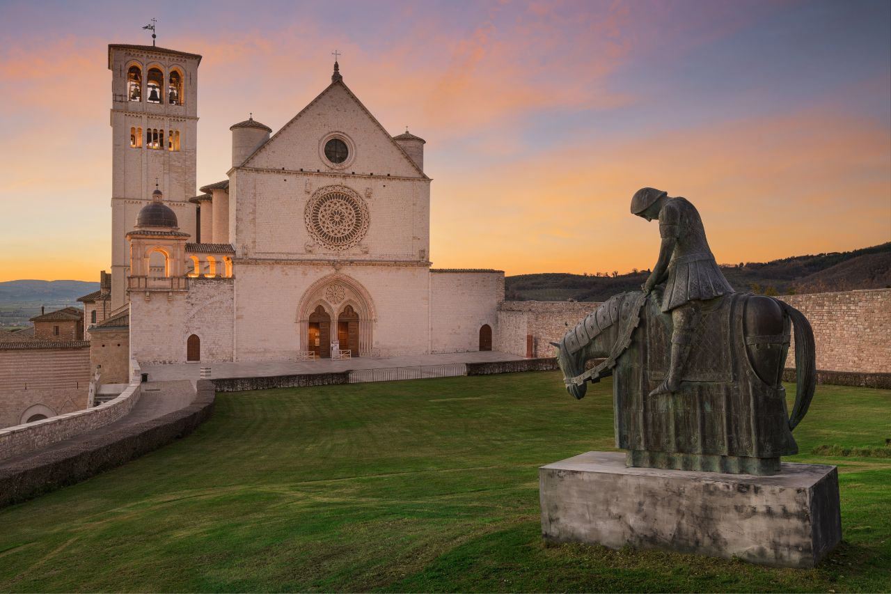 A serene view of Assisi, Italy, showcasing the medieval architecture