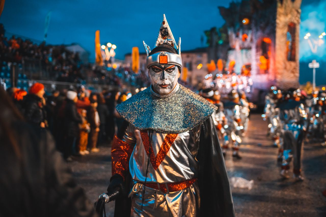 A masked man at the Viareggio Carnival