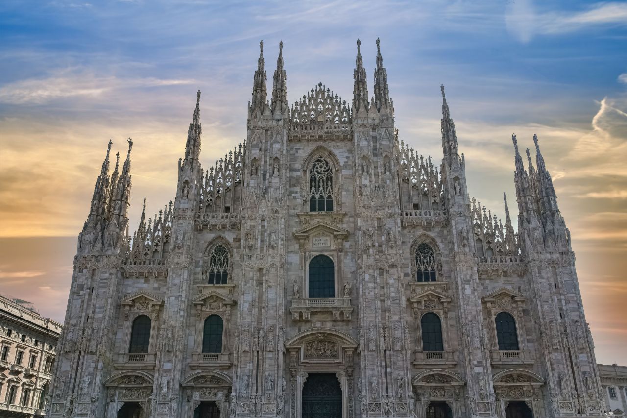 Sunset view of the famous and symbolic monument of the city of Milan, the Milan Cathedral.
