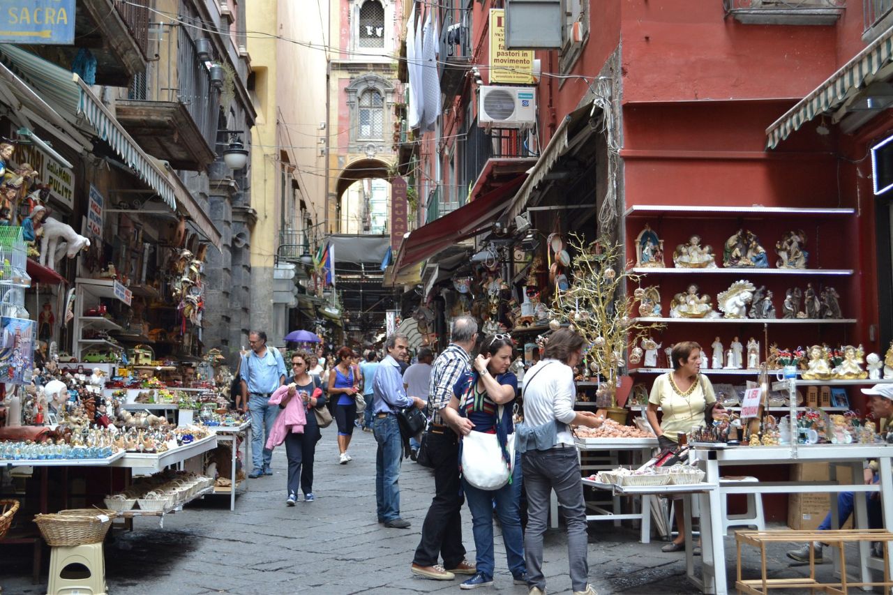 Some tourists go shopping in Via San Gregorio Armeno