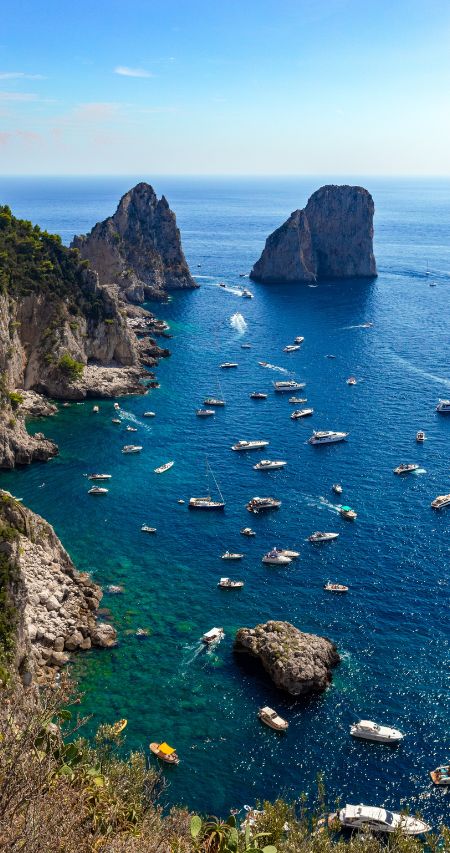 Many tourists have rented boats to explore the island of Amalfi
