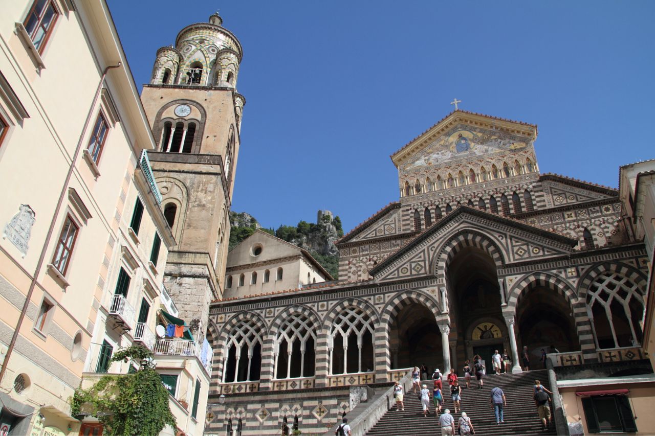 Tourists are visiting the cathedral of Amalfi