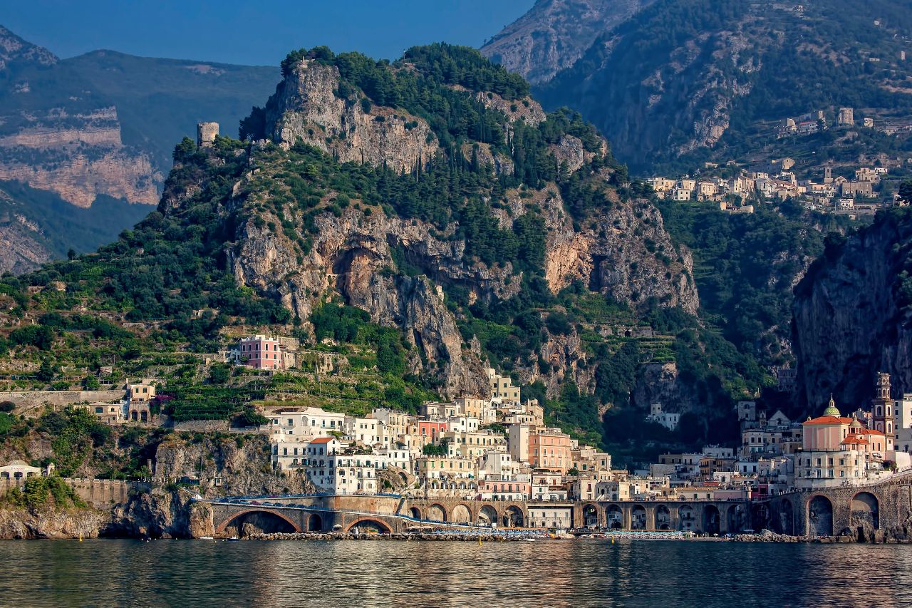A view of a town along the Amalfi Coast, seen from boat.