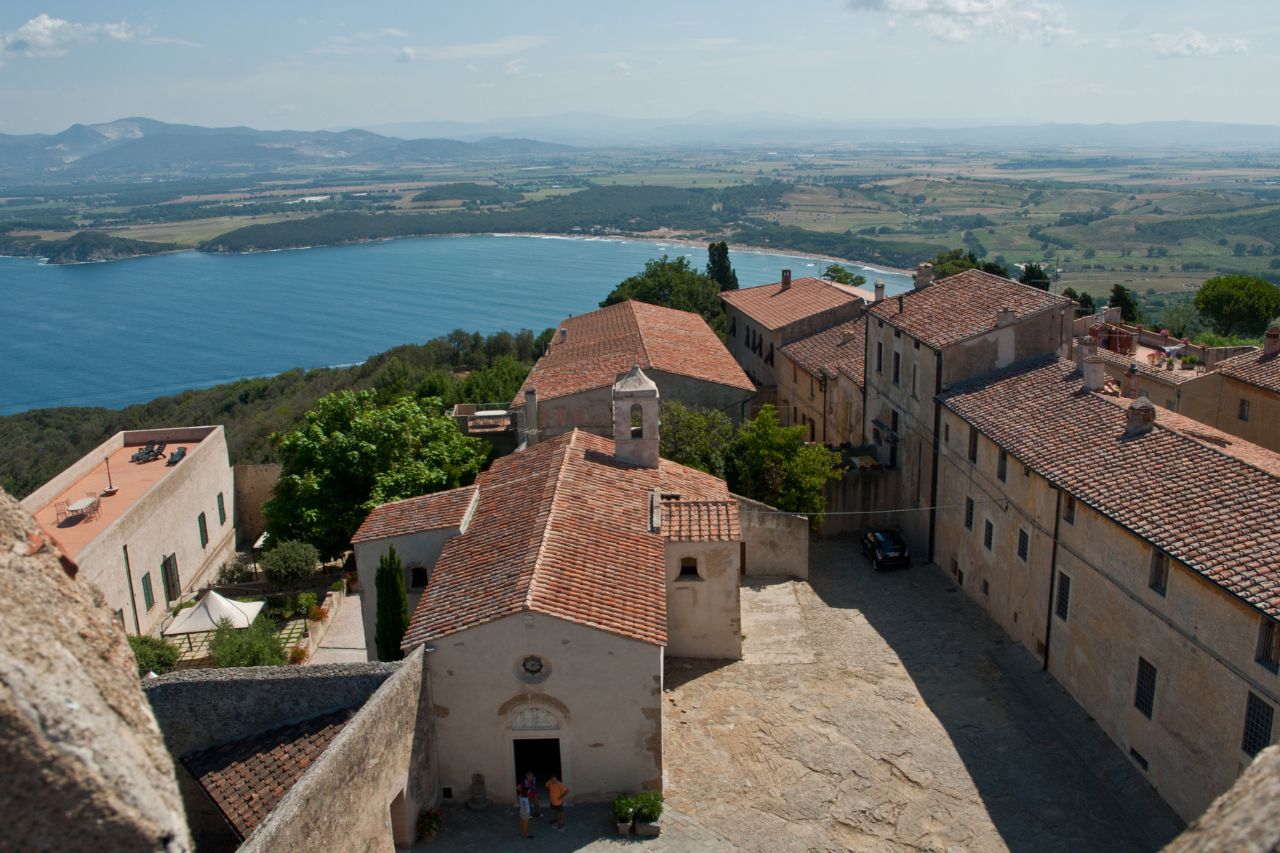 An areal view of the Tuscan coastal town of Populonia.
