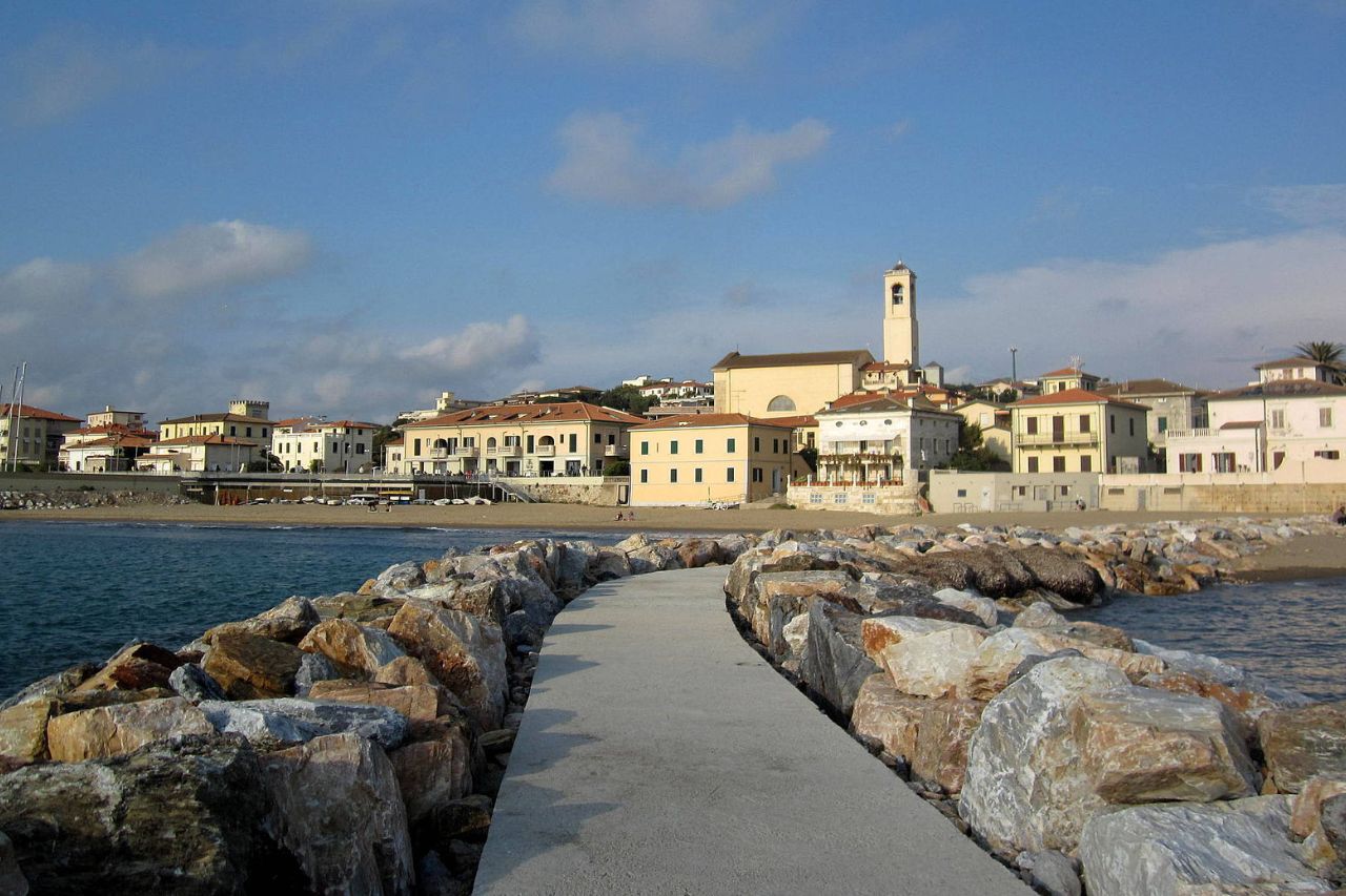 A view of The historic tower of San Vincenzo from the path way.