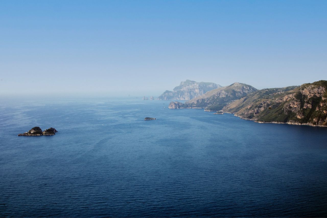 A blue sea and the coast around Praiano