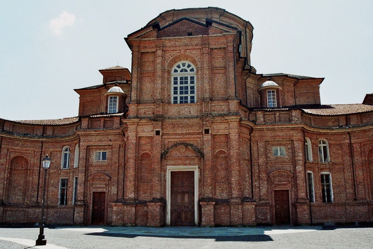 The view of the Palace of Venaria from outside on a sunny day.