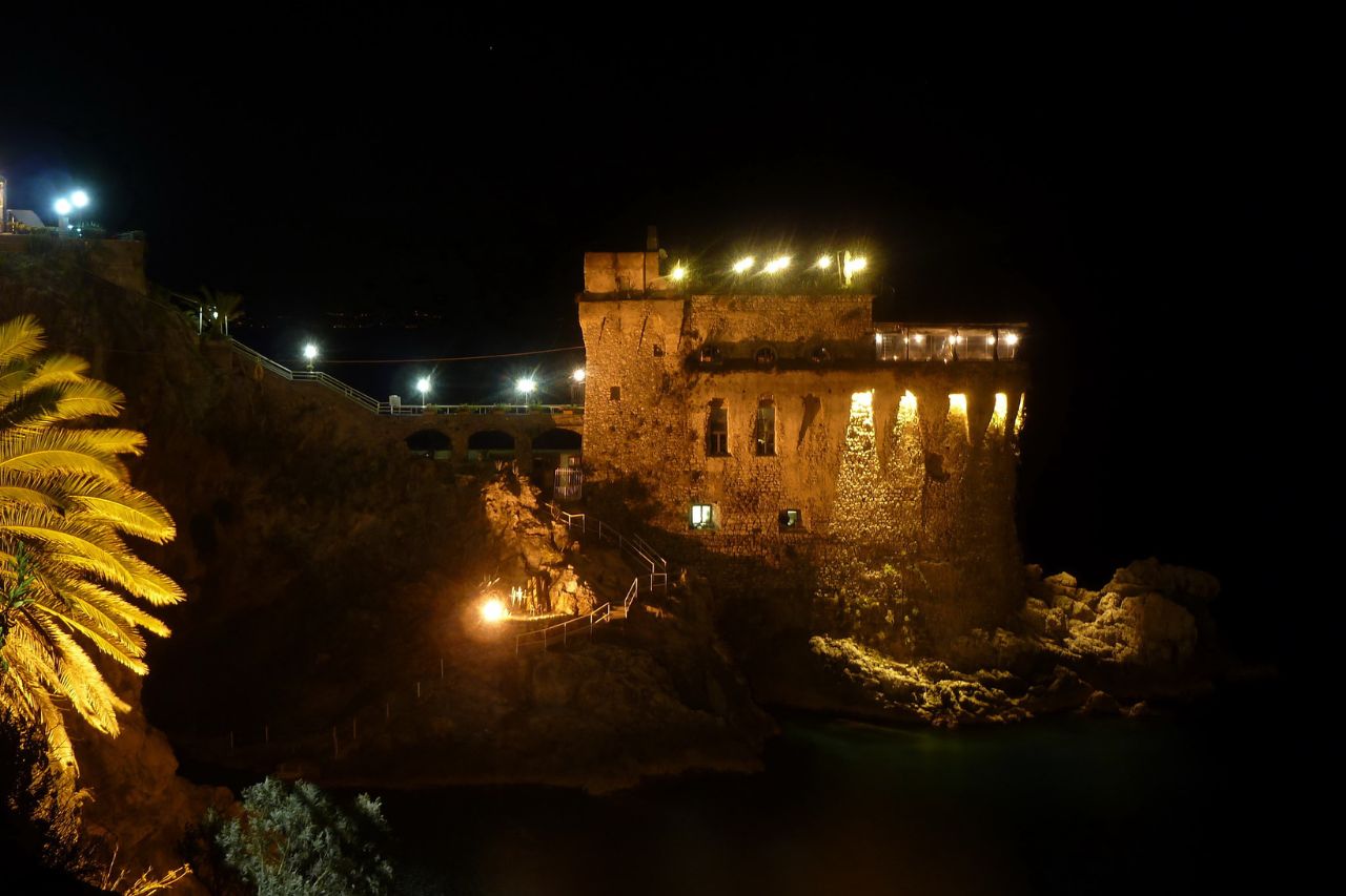 Nighttime view of The Norman Tower on the Amalfi coast