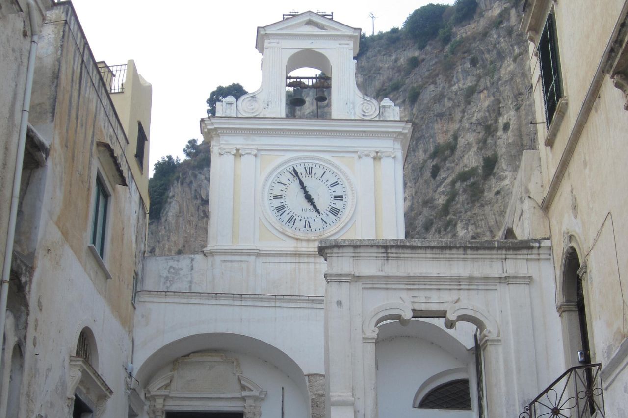 The Church of the Saint Savior with the big clock is located in Atrani, Italy