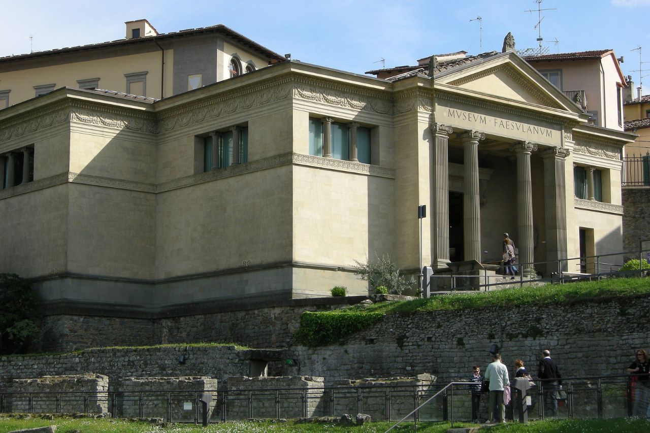 Tourists are entering the archaeological museum of Fiesole