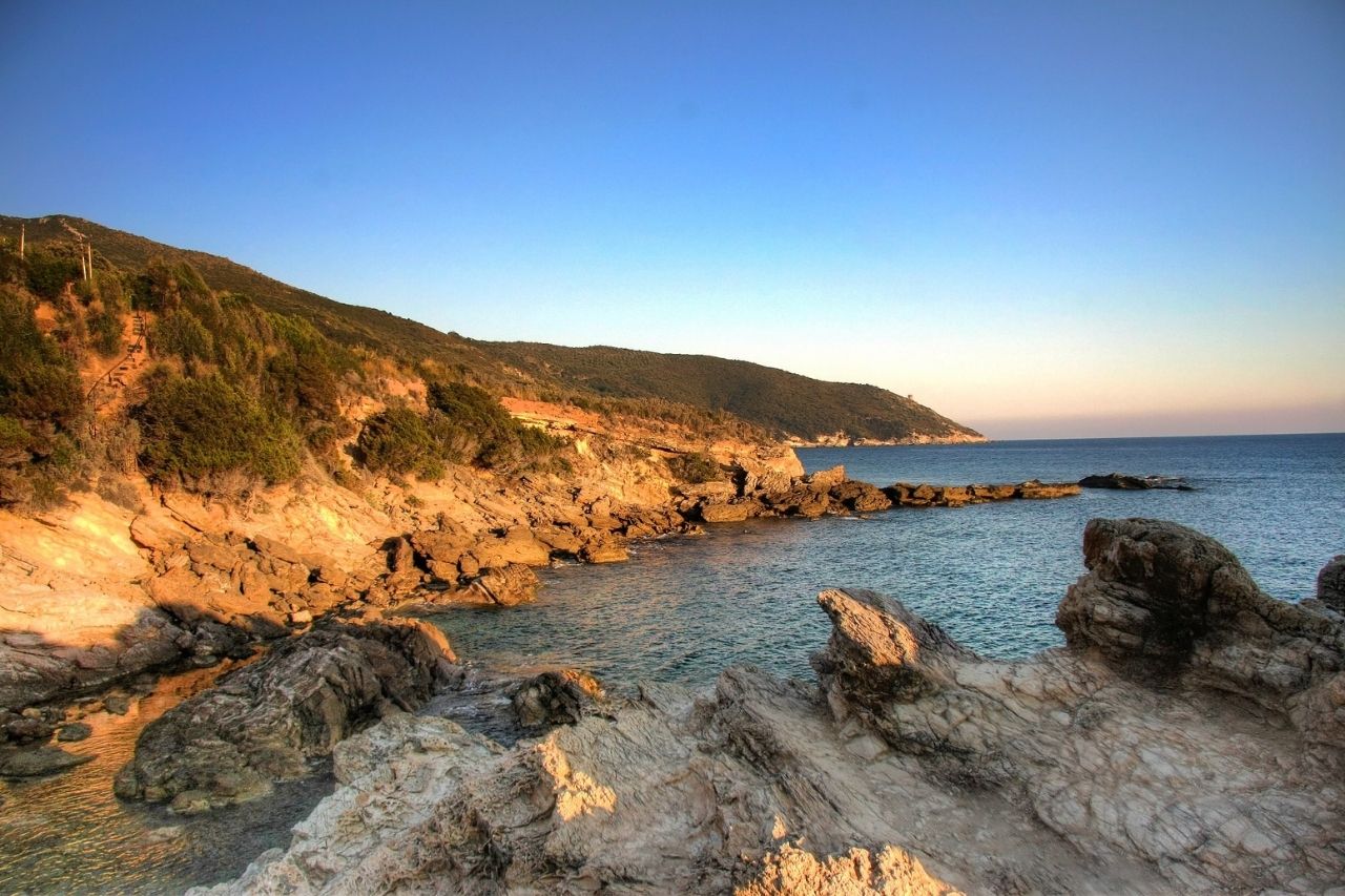 The Cala del Mar Dead beach photographed at sunset