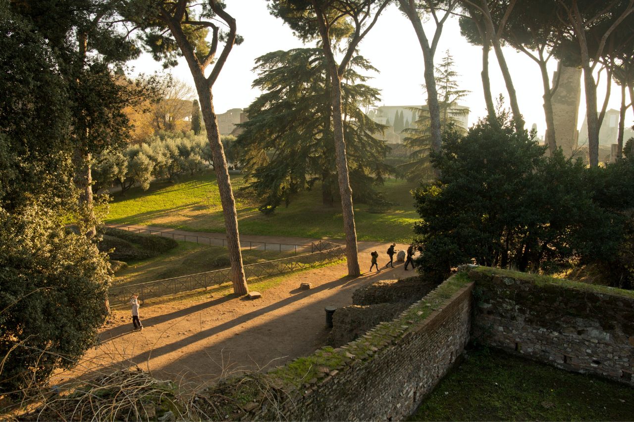 Tourists stroll in the Farnesian Gardens on the Palatine, Rome