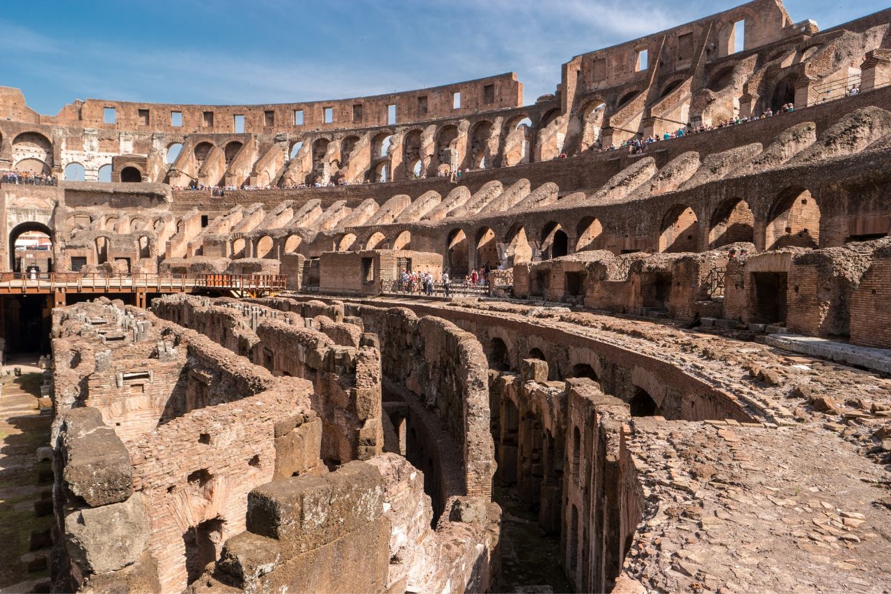 Immerse yourself in the past and feel like a gladiator while standing inside the Colosseum in Rome. Experience the grandeur of this ancient amphitheater, where epic battles and events once took place, and imagine the awe-inspiring spectacles that unfolded in this historic arena."
