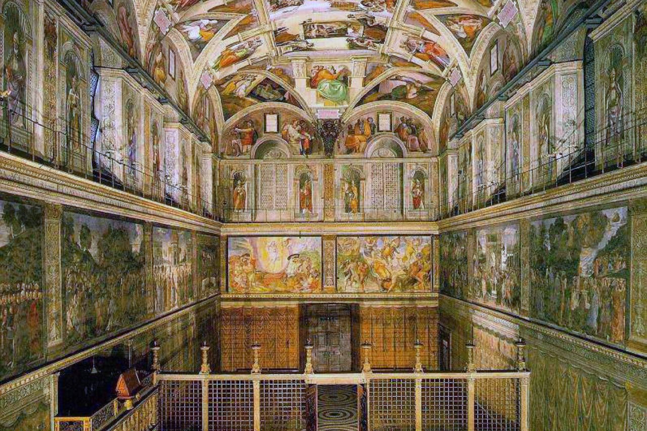 The Sistine Chapel, a renowned masterpiece of Renaissance art and architecture. The image captures the stunning interior of the chapel, adorned with Michelangelo's famous ceiling frescoes, including 'The Creation of Adam' and 'The Last Judgment.