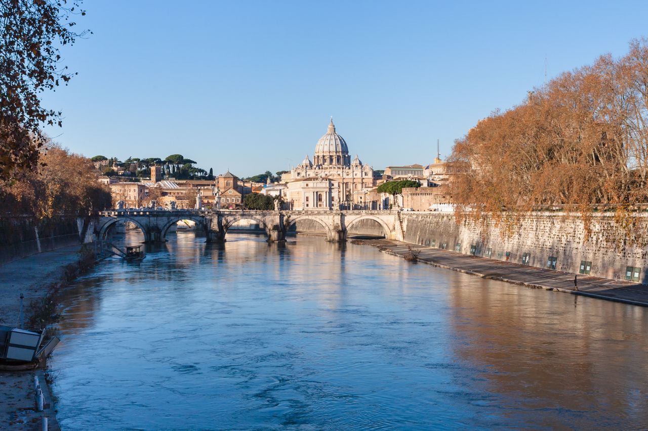 Iconic view of Rome, Italy, showcasing historic landmarks such as the Colosseum and the Roman Forum.