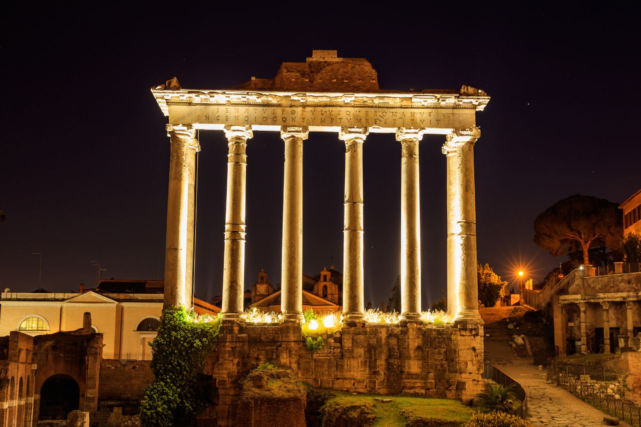 The beautiful Temple of Saturn in Rome during nighttime