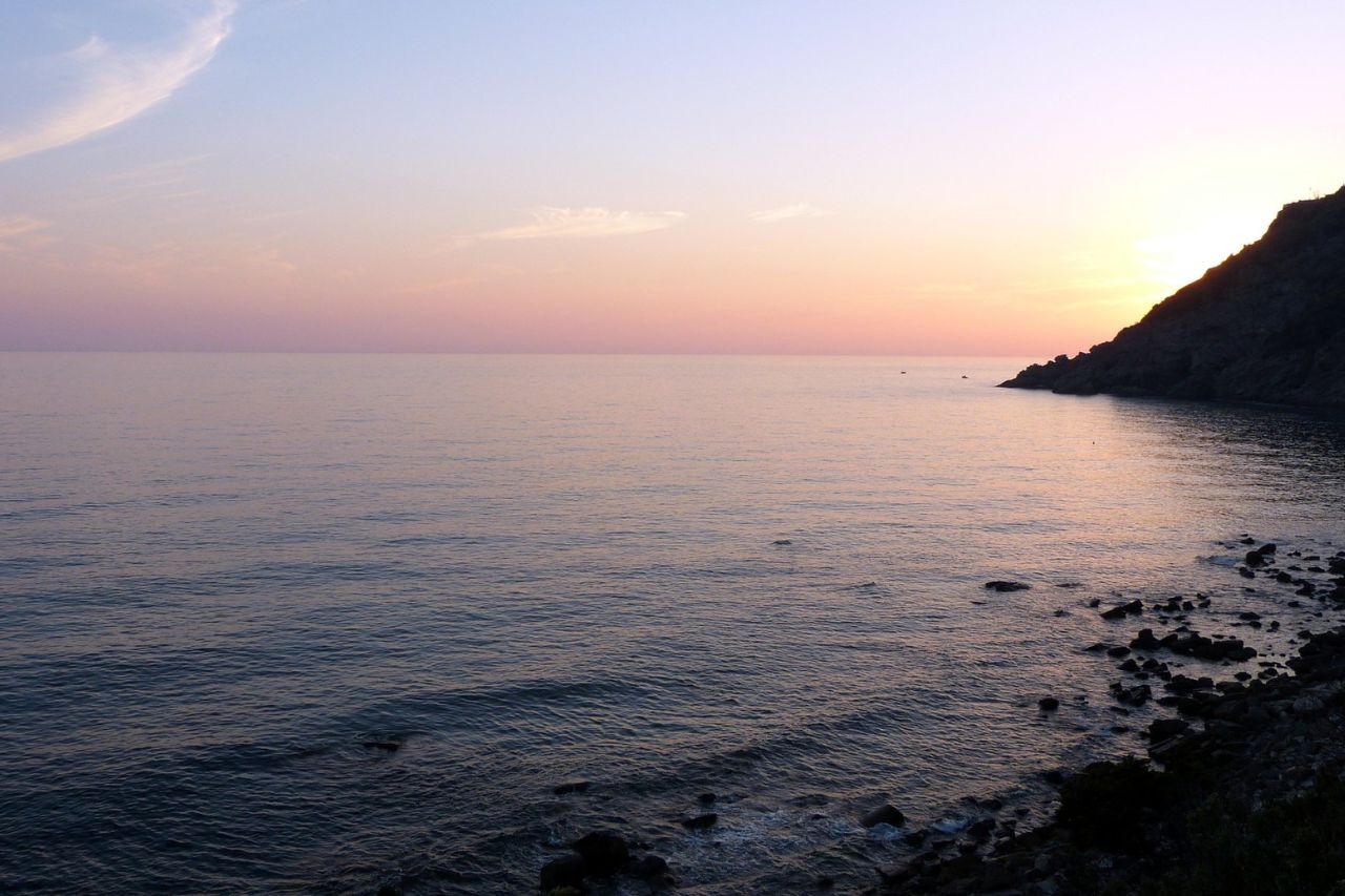 The sea of ​​Quercianella photographed at sunset, in Tuscany