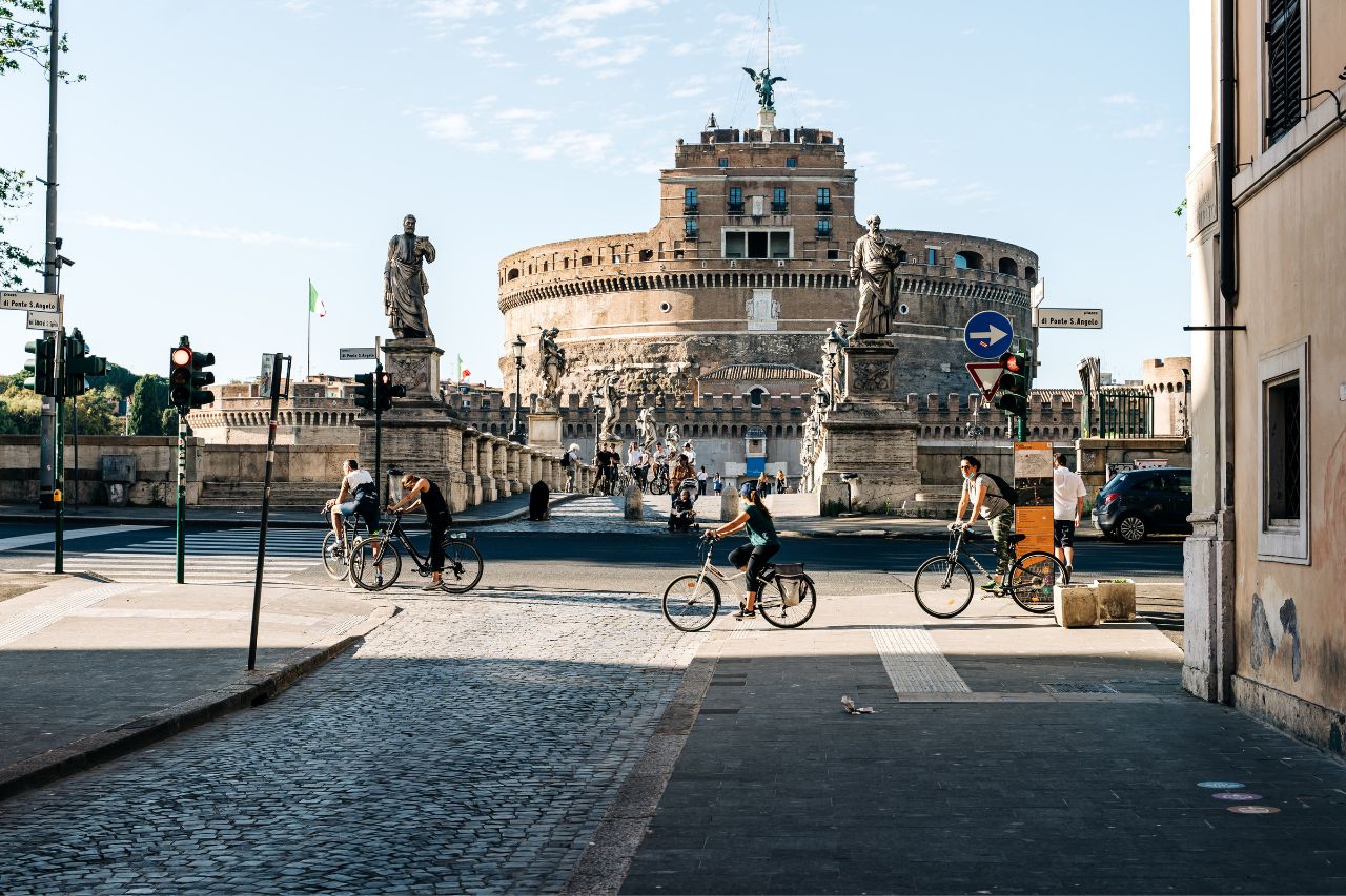 Tourists have rented a bicycle to go shopping in Rome with greater freedom
