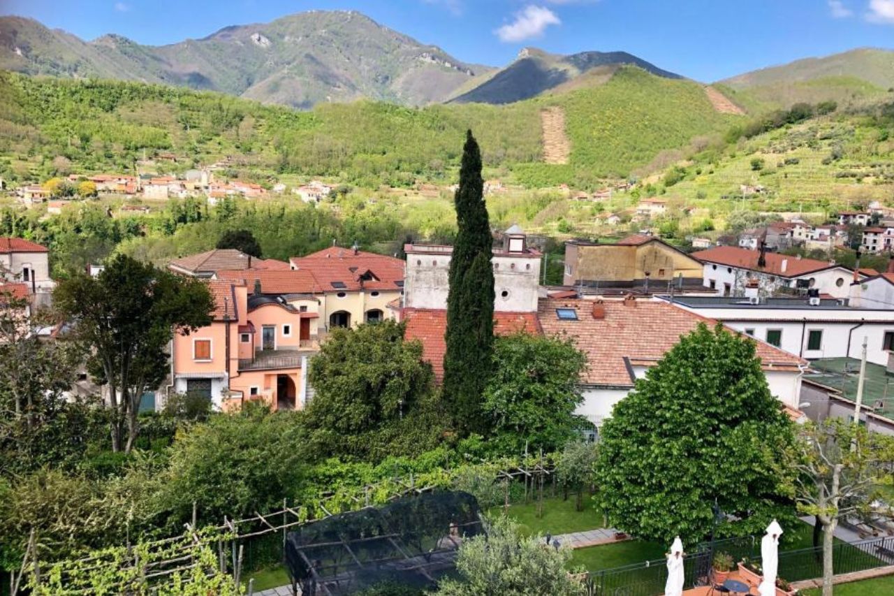 Beautiful view of mountains and houses from the terrace of the Farfalle E Gabbiani