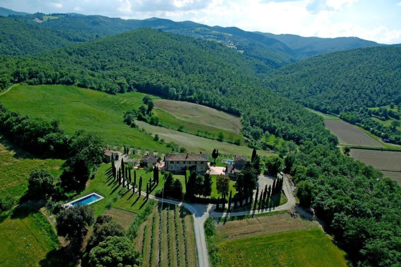 Aerial view of beautiful and welcoming structure, surrounded by greenery located at the Agriturismo La Scarpaia