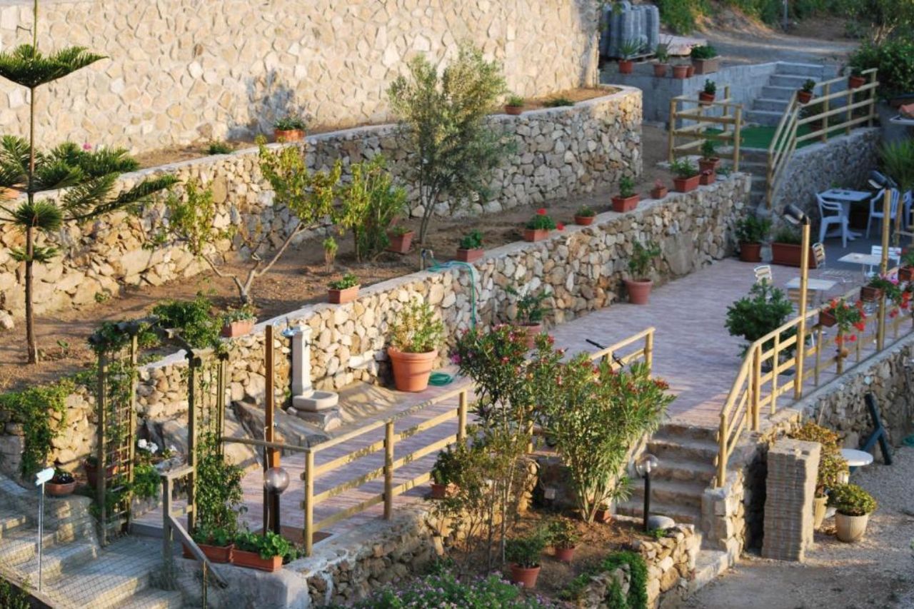 The Hotel Giardino delle Palme has a beautiful, clean structure surrounded by gardens