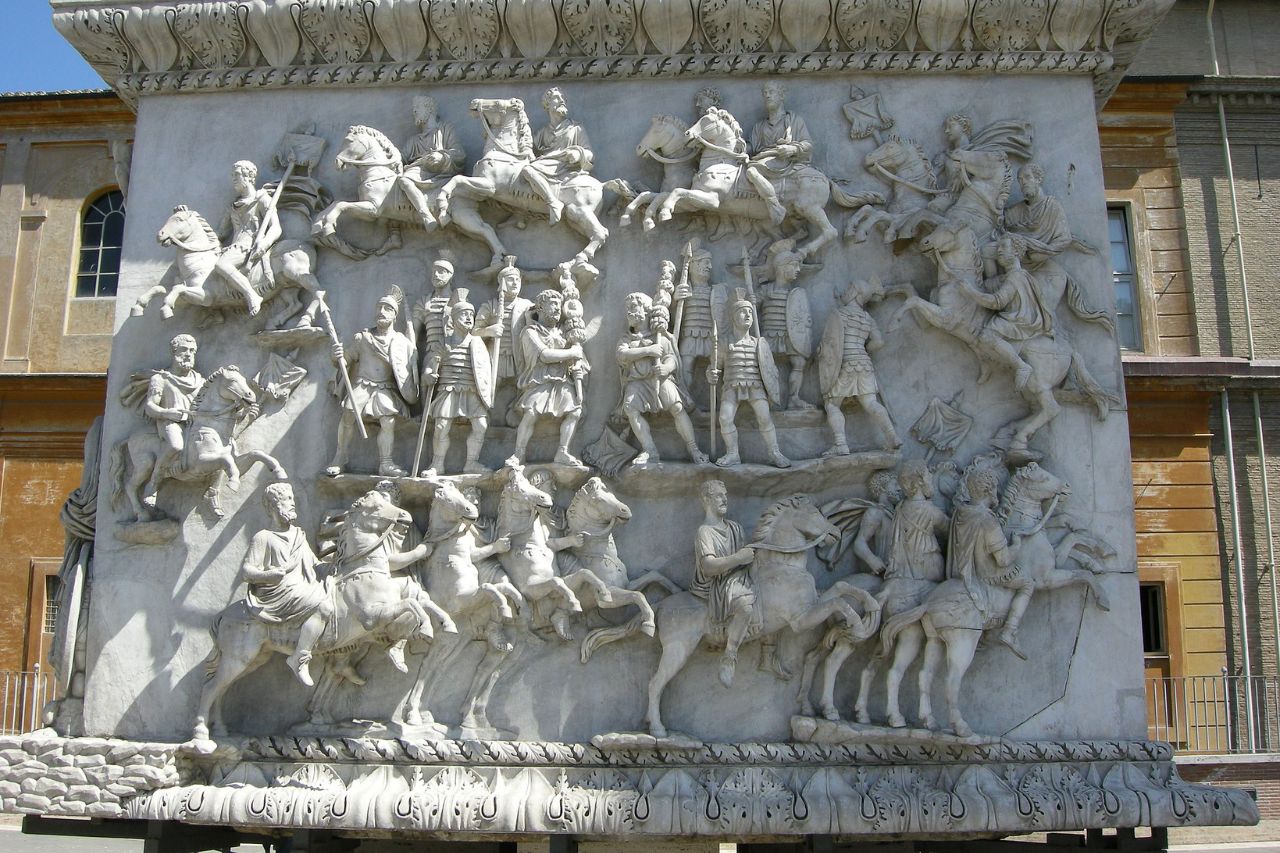 "Column of Antoninus Pius - A striking view of the ancient Roman monument, depicting scenes from the reign of Emperor Antoninus Pius through intricate carvings and reliefs."