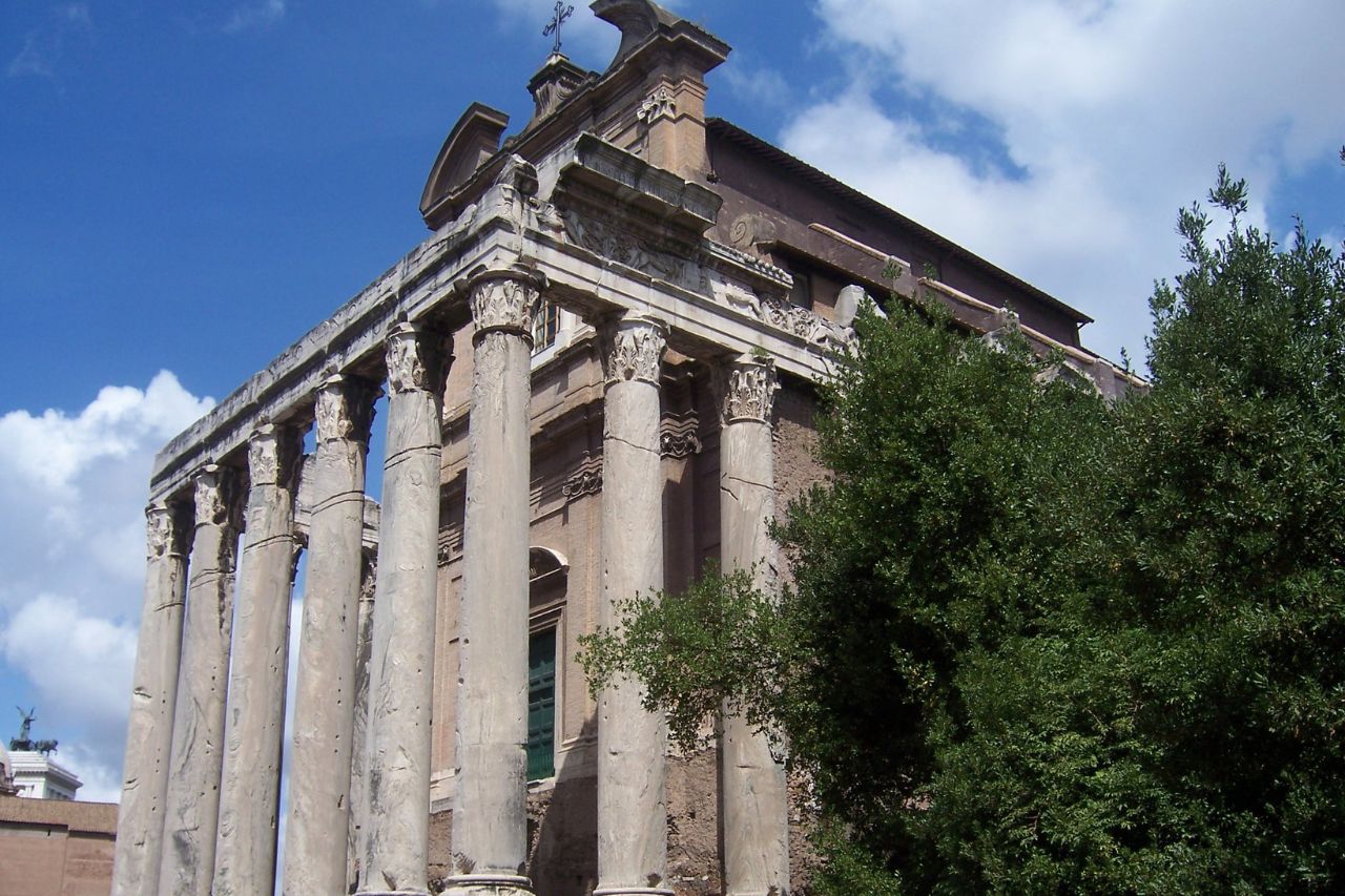 "Columns of Via Sacra - A captivating image capturing the ancient columns along Via Sacra, evoking the historical splendor of the Roman Forum in Rome, Italy."