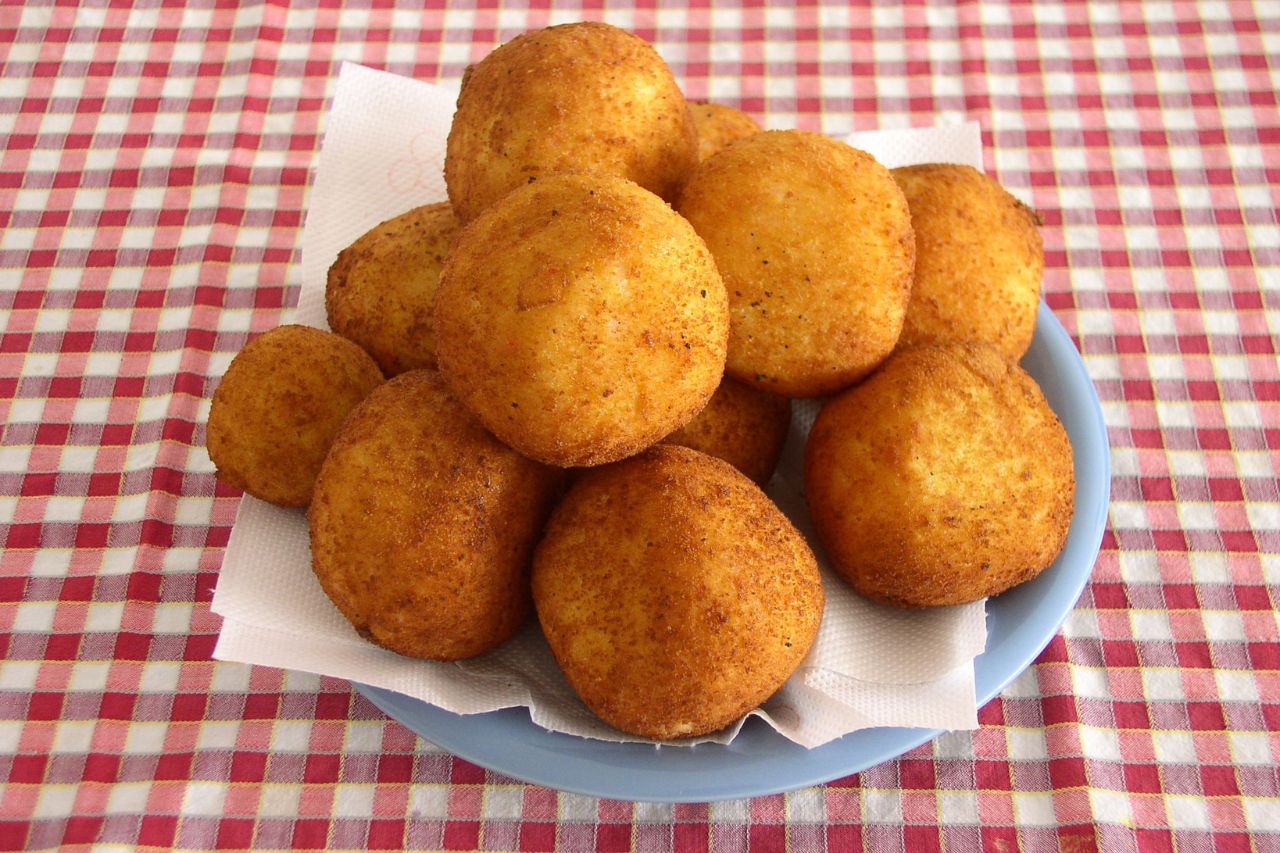 Arancini, Italian rice balls, served on a plate