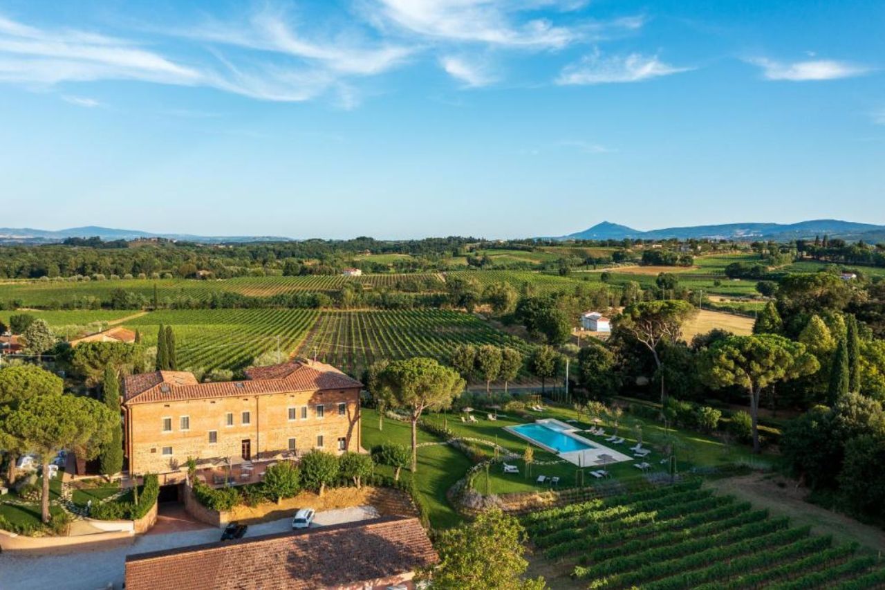 Aerial view of the Villa Svetoni Wine Resort with outdoor swimming pool and huge vineyard.