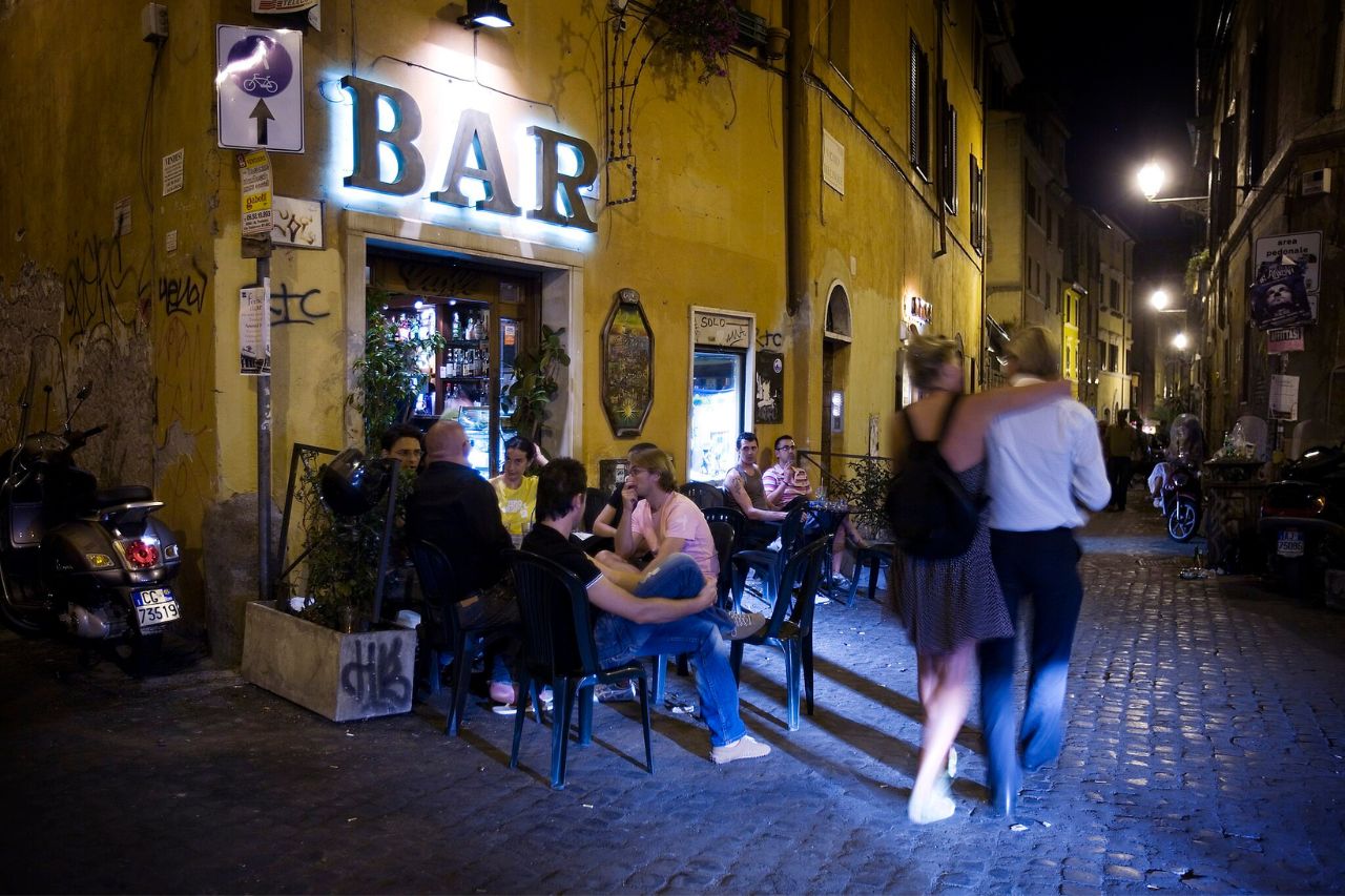 A vibrant scene of Bohemian nightlife in the charming district of Rome, Italy