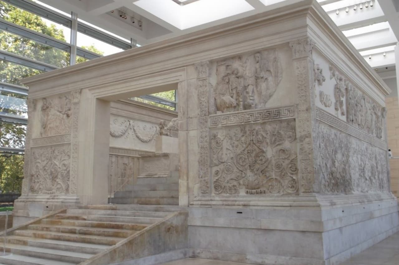 Tourists are visiting the Ara Pacis monument