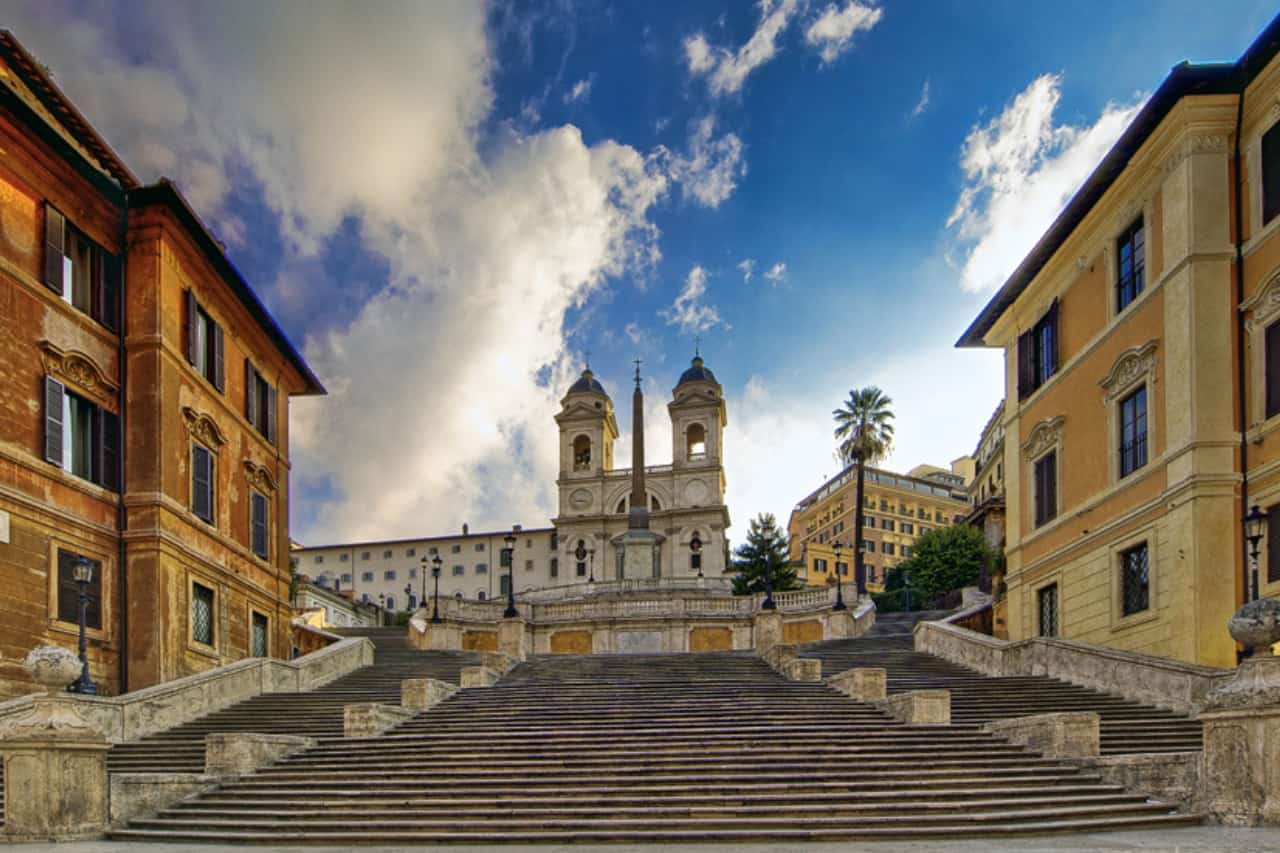The Spanish steps are a symbolic monument of Rome and tourists are walking them