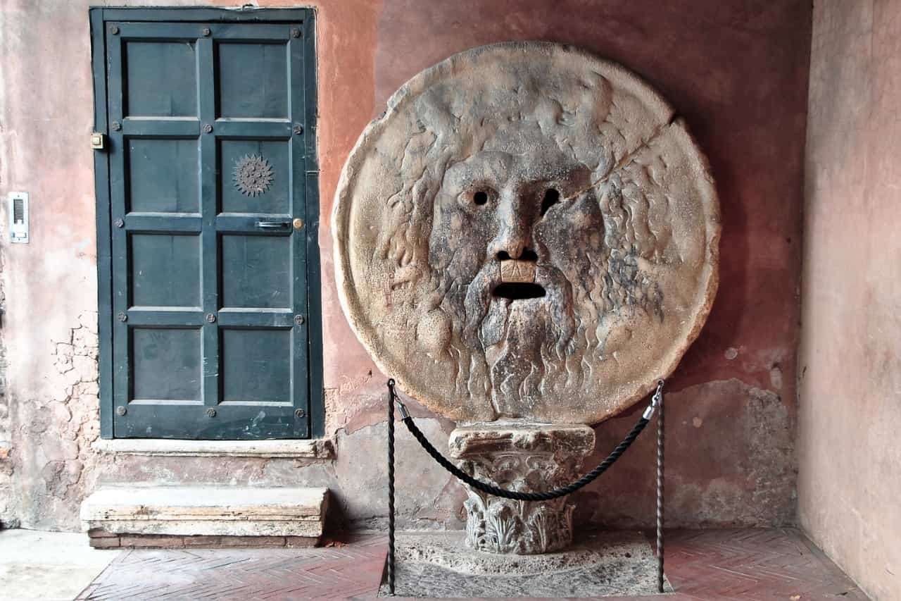 The Mouth of Truth (Bocca della Verità) in Rome, Italy, it's a famous ancient marble mask sculpture with an open mouth