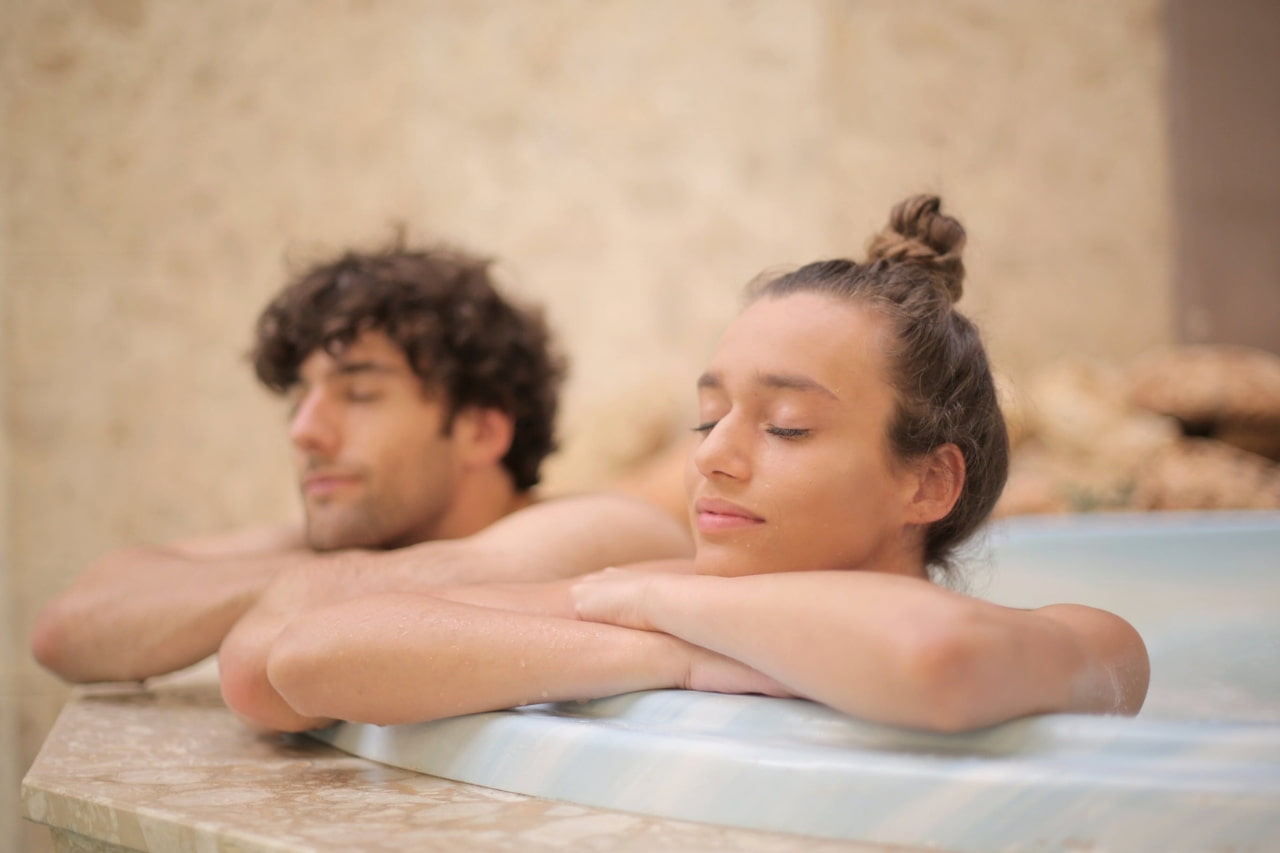 Couple indulging in a relaxing spa experience in Rome.
