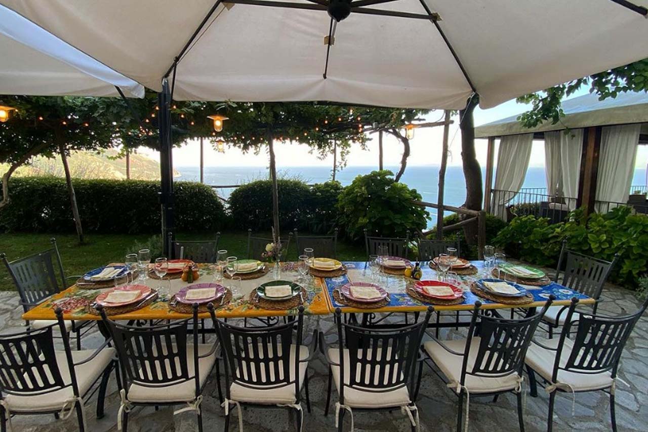 Outdoor dining area with beautiful view of the sea at the Da Nonno Alfonso!