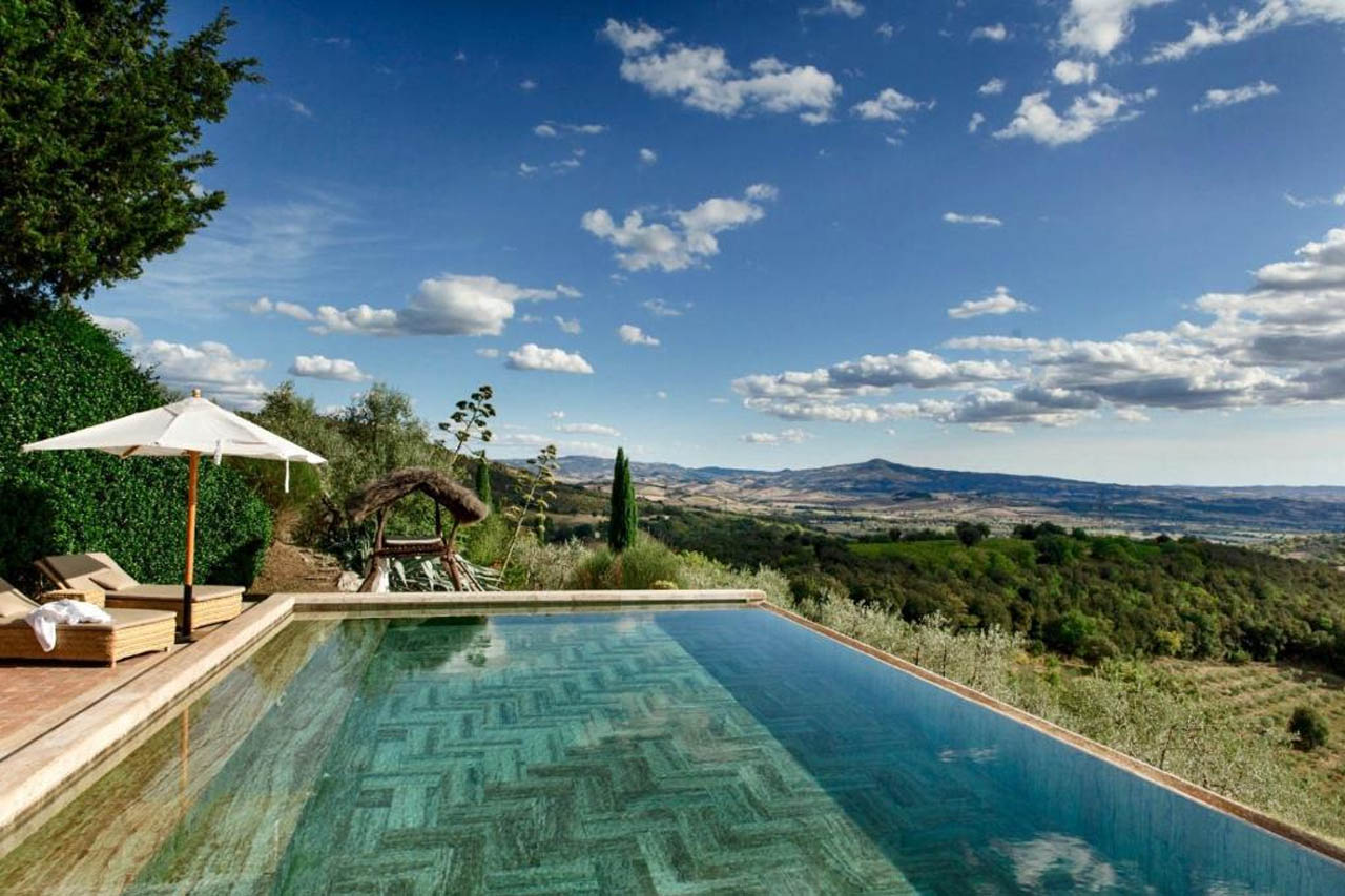 Aesthetic Outdoor pool with a stunning view of the landscape in the Castello Di Vicarello