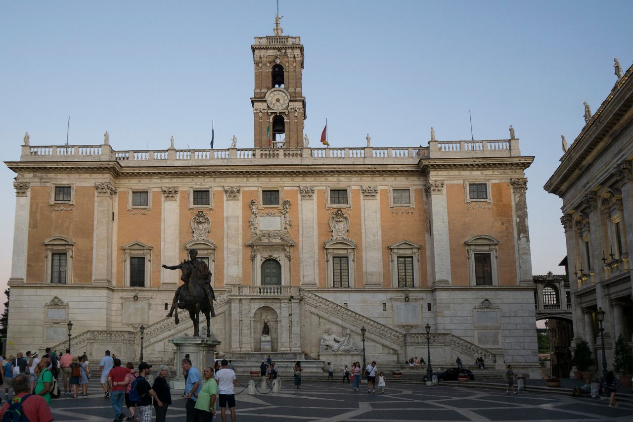 Tourists are entering the Capitoline Museum, near Piazza Venezia in Rome