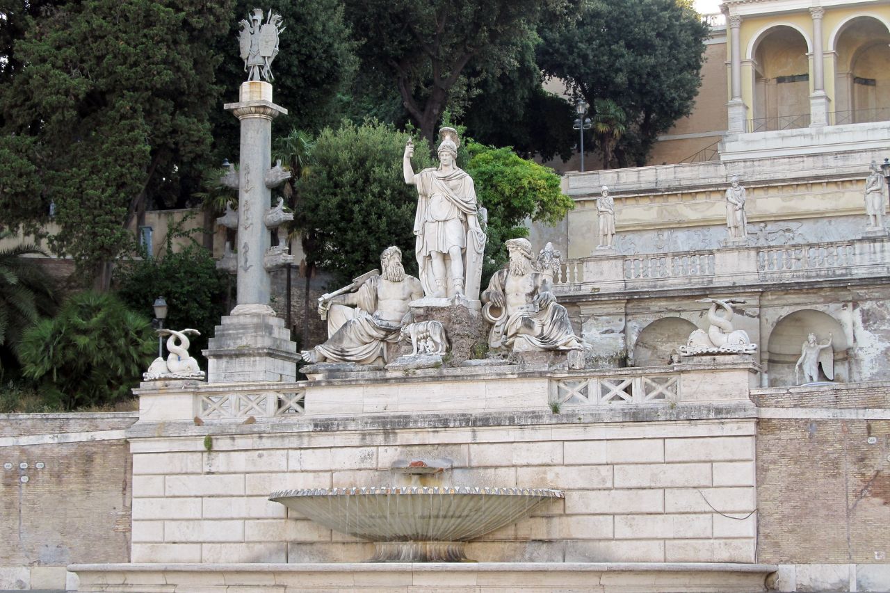 The beautiful fountain of Dea Roma with white statues