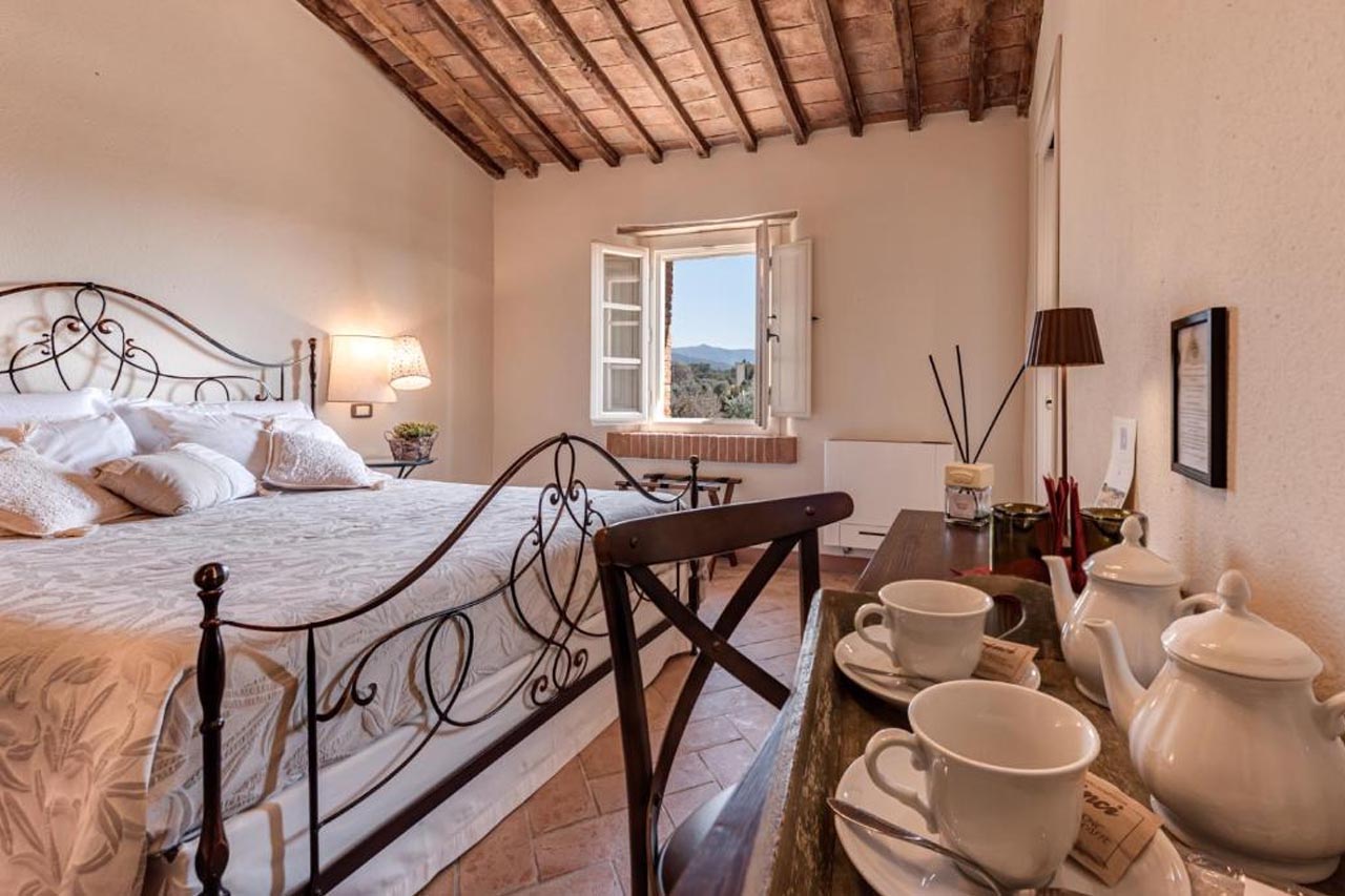 Comfortable bedroom with relaxing atmosphere in Locanda dell'Aioncino