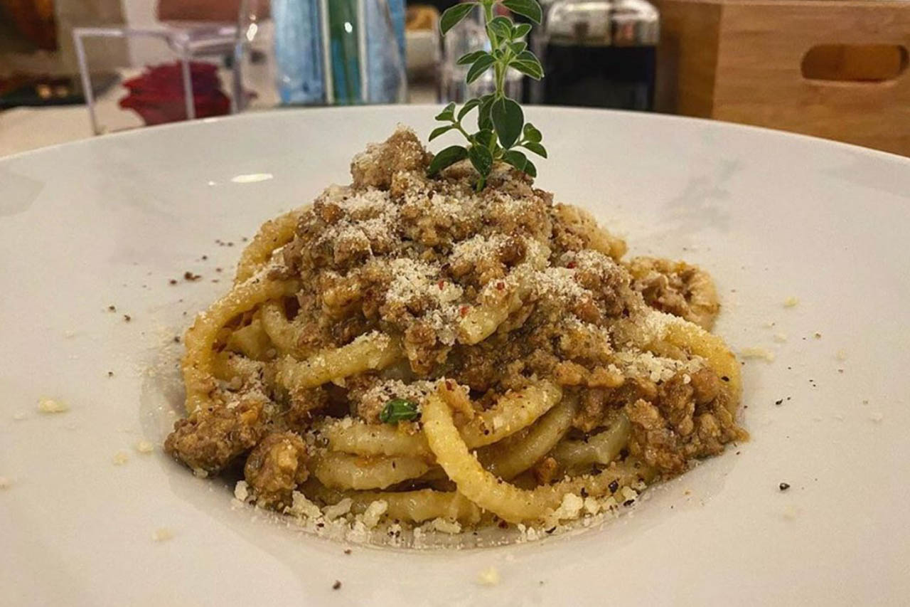 Pici with meat sauce served by the Branduccio Restaurant