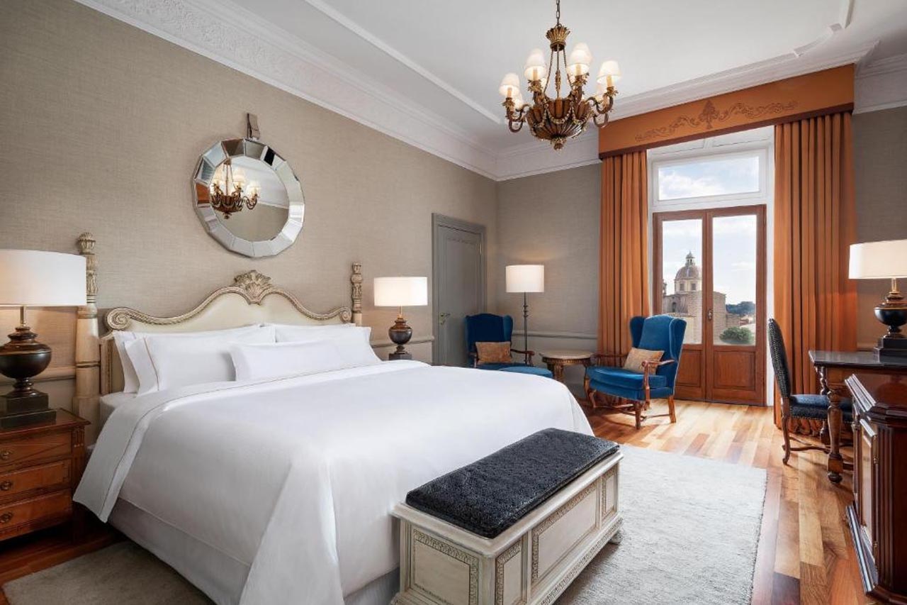 Luxury room with an overlooking view of the church from the window in The Westin Excelsior, Florence