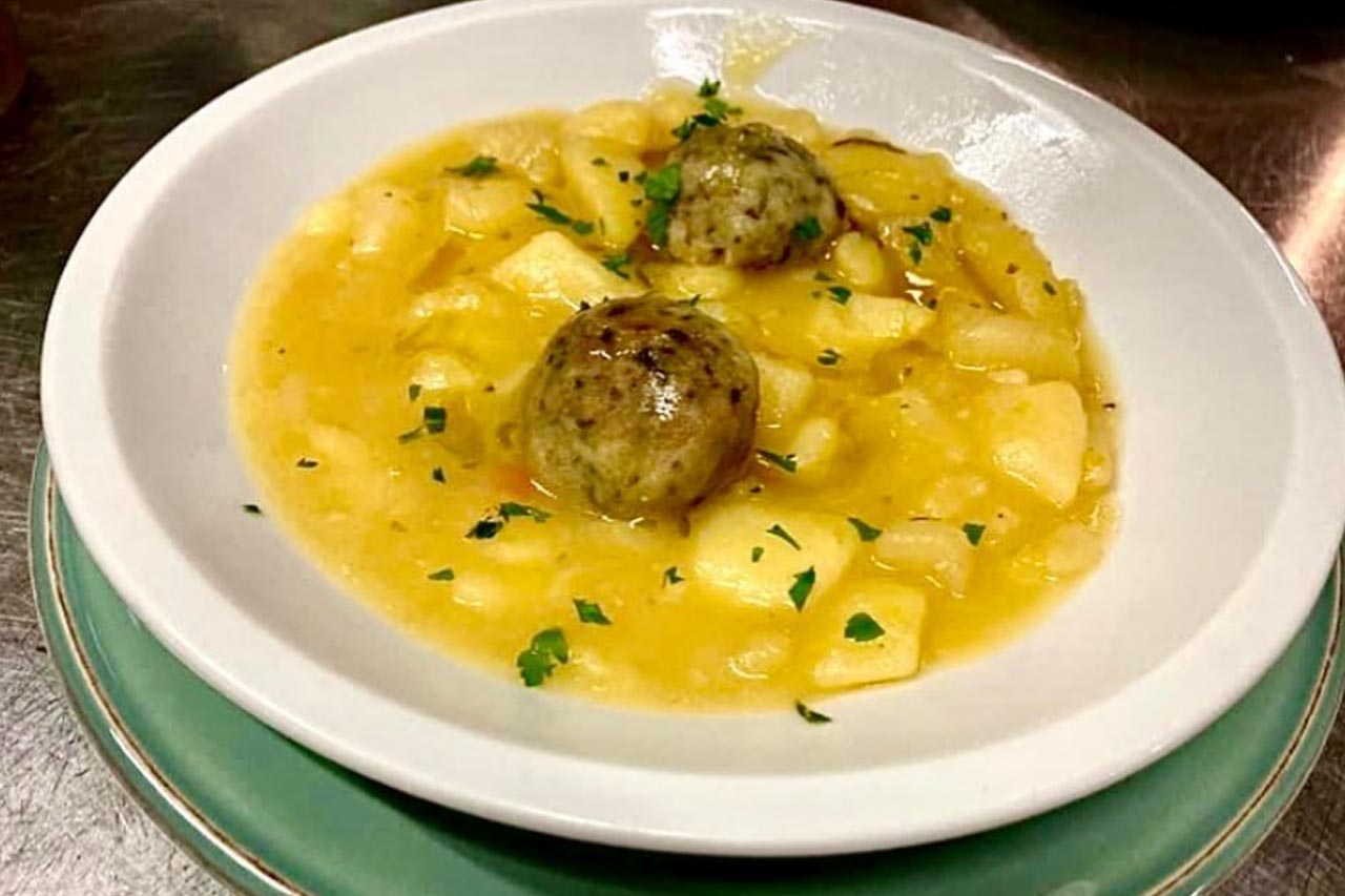 Delicious dish made of Tuna meatballs in potato soup cooked by the L’Asino d’Oro di Lucio Sforza