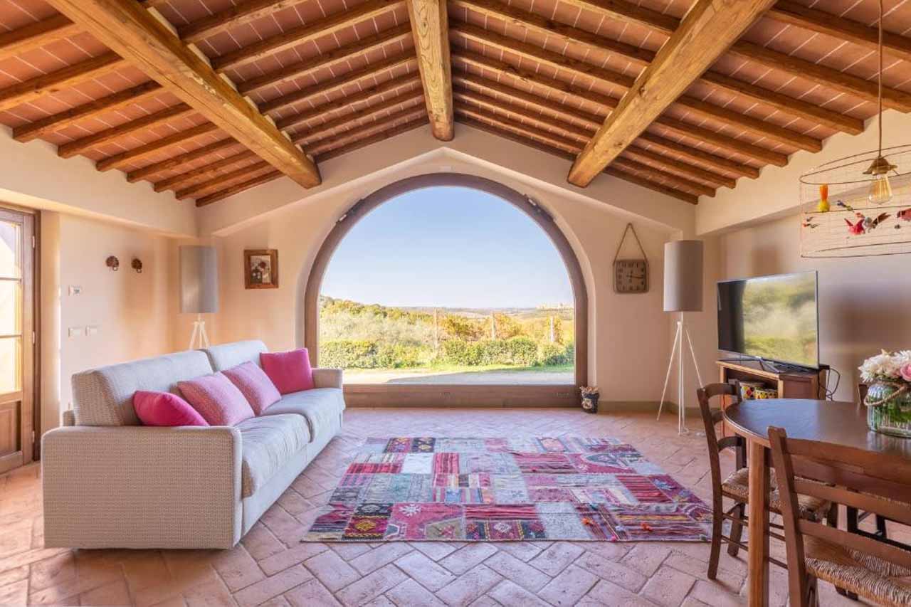 Aesthetic living area with a beautiful view of a farm in Borgo dé Brandi