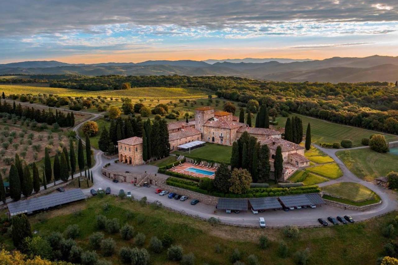Aerial view of the Borgo Scopeto Wine & Country Relais with stunning of a landscape